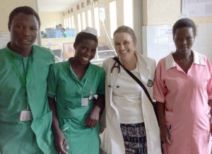 Jenifer Lasman (2nd from right) on the ward at Mbale Hospital with (left to right) Habert Omusei, Christine Khayiyi, and Esther Cherop