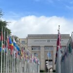 An image of the UN in Geneva with flag flying during the World Health Assembly.