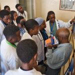 Fourth-year Bachelor of Medicine, Bachelor of Surgery (MBBS) students participate in an orientation session led by Dr. Prosper Lutara, Family Medicine Lecturer, as they begin their clinical rotation at Mangochi District Hospital.