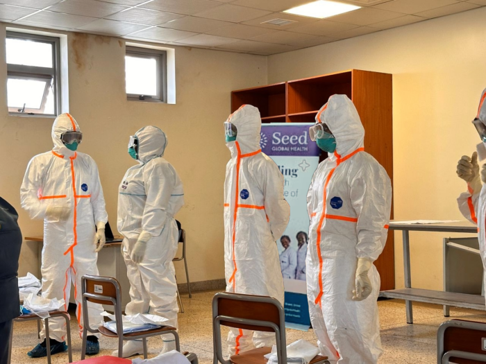 Health workers at Mulago National Referral Hospital in Uganda participating in practical elements of the specialised infection and prevention control training.