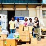 Seed staff members delivering personal protective equipment to Mulago National Referral Hospital in Uganda.